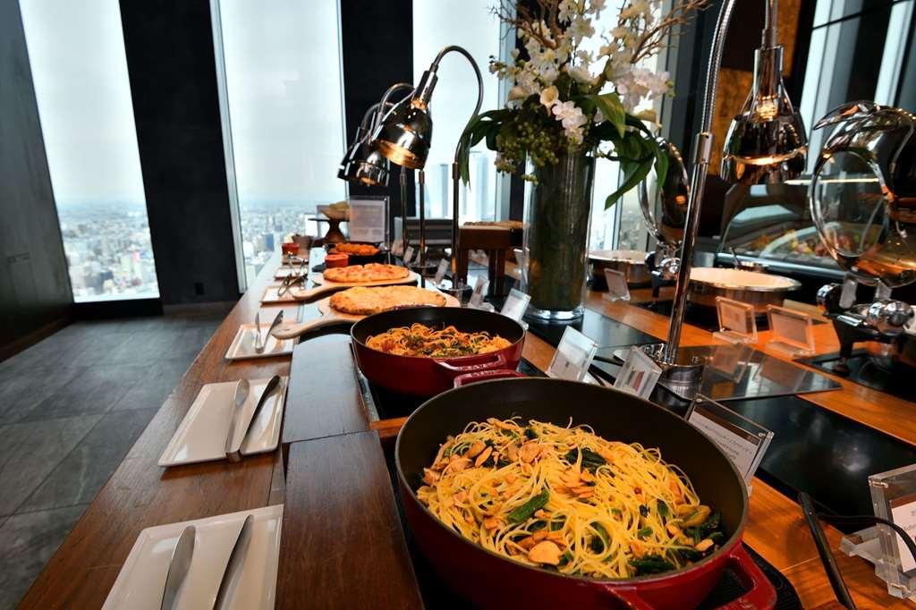 Nagoya Prince Hotel Sky Tower Ресторант снимка A buffet at the 360 Restaurant in the 360° Sky Lounge, at the top of the Umeda Sky Building in Osaka, Japan